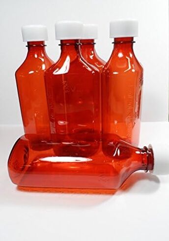 6 عبوات من زجاجات الدواء/المشروبات الكحولية البيضاوية المتدرجة الجديدة بوزن 8 أونصة مع أغطية in Kuwait