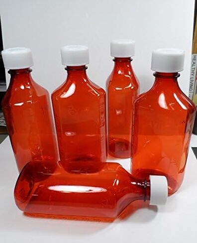 6 عبوات من زجاجات الدواء/المشروبات الكحولية البيضاوية المتدرجة الجديدة بوزن 8 أونصة مع أغطية in Kuwait