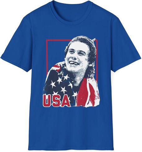 Jack Hughes Gold Medal Champion T-Shirt - USA 2026 Hockey Apparel - Colors Royal and Grey - Sizes XS-5XL in Saudi Arabia