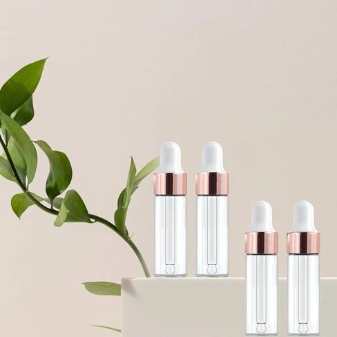 50 Pack 5ml Mini Clear Glass Essential Oil Dropper Bottle with Rose Gold Lid Sample Containers Perfume Liquid Vials for Traveling in Saudi Arabia