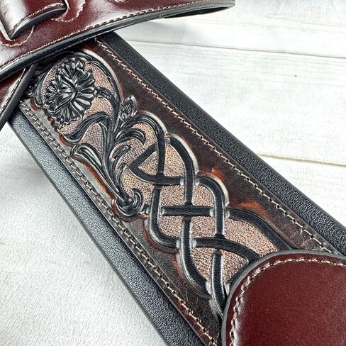 Walker And Williams KB-07 Dark Walnut Brown Body With Black Celtic Chain Carving Full Grain Carving Leather Padded Strap For Acoustic, Electric, And Bass Guitars in Saudi Arabia