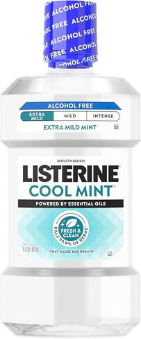غسول الفم ليسترين خفيف جدًا خالي من الكحول، غسول الفم مدعم بالزيوت العطرية يقتل 99.9% من الجراثيم التي تسبب رائحة الفم الكريهة من أجل فم نظيف، بدون أصباغ إضافية، نكهة نعناع باردة خفيفة، 1 لتر in Kuwait