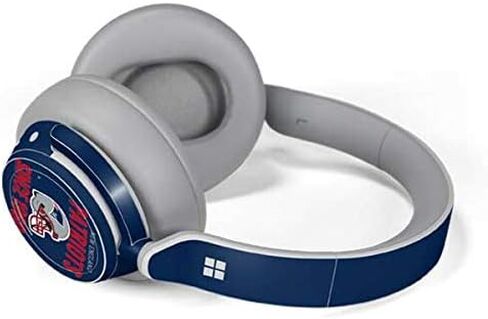 Skinit Decal Audio Skin Compatible with Surface Headphones - Officially Licensed NFL New England Patriots Helmet Design in Saudi Arabia