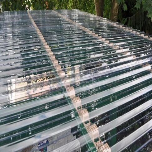 100-Pack Clear Polycarbonate Roofing Panels 72" L x 21" W, Corrugated Curved Roof Sheets for Patio, Greenhouse, Carport & Under-Deck Cover, Rainproof, High Light Transmission in Saudi Arabia