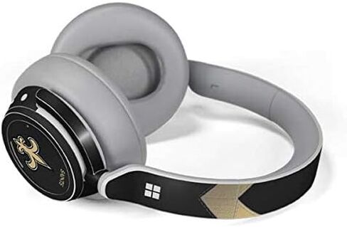 Skinit Decal Audio Skin Compatible with Surface Headphones - Officially Licensed NFL New Orleans Saints Team Jersey Design in Saudi Arabia