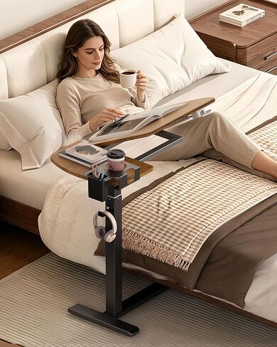 Overbed Bedside Table with Wheels, Pneumatic Adjustable Overbed Table, Tilting Desktop Mobile Standing Desk with Cup Holder/ Pen Holder, Rolling Laptop Desk for Bed, Sofa, or Hospital Use (Walnut) in Saudi Arabia