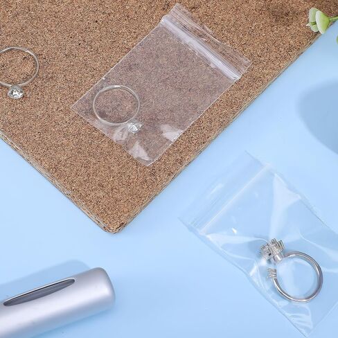 200Pcs 1.5"x2.5" 10 Mil Small Clear Plastic Bags, Plastic Reclosable Zip Seal Lock Bags Heavy Duty Mini Zip Bag Resealable Multipurpose Storage Bag for Jewelry, Bead, Crafts, Small Parts Storage in Saudi Arabia