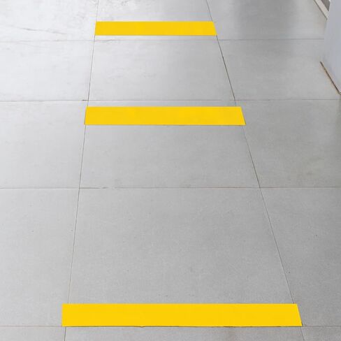 SmartSign Yellow Floor Marking Tape, 4" Wide x 100' Long Roll, Durable Polyester, Laminated Protection - Non-Abrasive, Adhesive Safety Tape for Warehouses, High Traffic/Forklift Areas, Removable in Saudi Arabia