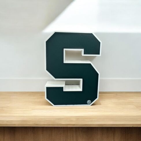 شعار S مزخرف مطبوع ثلاثي الأبعاد لولاية ميشيغان، شكل عرض قائم بذاته، أخضر وأبيض، ديكور لمشجعي الرياضة الجامعية in Kuwait