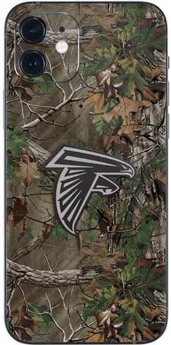 ملصق هاتف Skinit متوافق مع iPhone 12 - تصميم مموه أخضر مرخص رسميًا من NFL Atlanta Falcons Realtree Xtra in Saudi Arabia