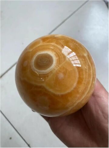 1 قطعة 200-250 جرام كرة كريستالية من الكالسيت الأصفر والبرتقالي in Kuwait