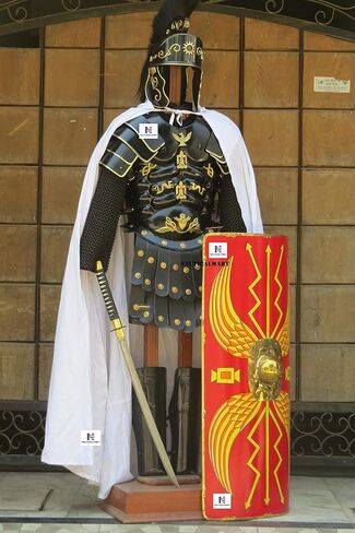 NauticalMart Roman Black Muscle Armor Cuirass Set W/Shoulders, Leg Guard, Roman Helmet, Chainmail, Roman Shield in Saudi Arabia