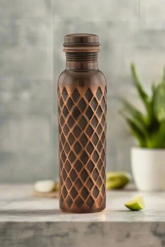 Ayurvedic Pure Copper Water Bottle 34 Oz | Leak Proof | Durable & Rust Proof | Traditional Copper Drinkware | Eco Friendly | Non Toxic And BPA Free in Saudi Arabia