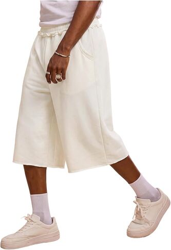 OYOANGLE Men's Baggy Long Sweat Shorts Loose Gym Jorts Basketball Athletic Cropped Capri Shorts with Pockets in Saudi Arabia
