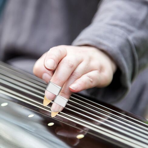 أغطية أظافر الأصابع من HANABASS Guzheng متوسطة الحجم سميكة على شكل قرن الثور، اعواد أصابع وهمية مع حماية لأطراف الأصابع لممارسة Guzheng والأداء، لون عشوائي in Kuwait