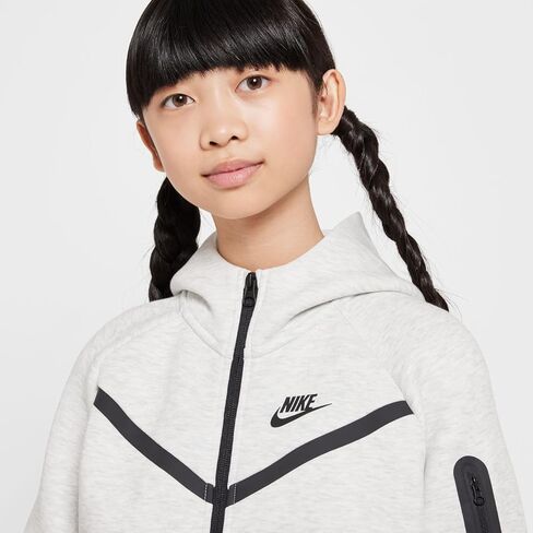 هودي بسحاب كامل للفتيات من Nike Sportswear Tech Fleece (HV8695-013، رمادي فاتح/هيذر/أسود/أسود) مقاس متوسط in Saudi Arabia