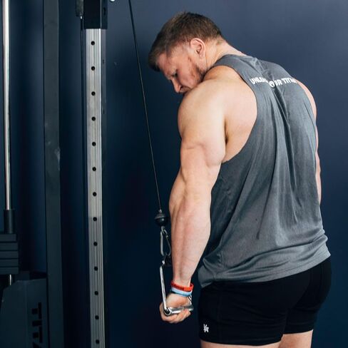 Titan Fitness Rotating D-Handle Cable Attachment, Ergonomic Knurled Grip, Chrome-Plated Solid Steel Build, Rotating Design Prevents Wrist, Elbow, and Shoulder Strain, Strength Training Accessory in Kuwait