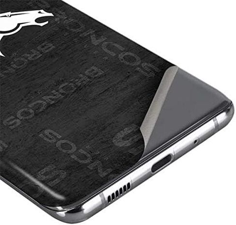 ملصق هاتف Skinit متوافق مع هاتف Galaxy S20 Plus - تصميم باللونين الأبيض والأسود مرخص رسميًا من الدوري الوطني لكرة القدم الأمريكية (NFL Denver Broncos) in Saudi Arabia