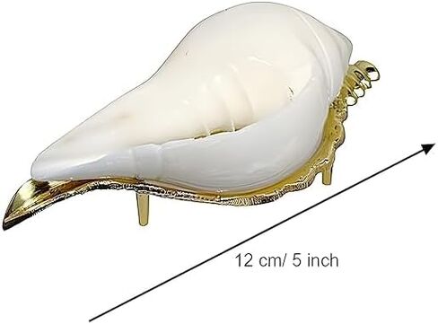 محارة طبيعية غير قابلة للنفخ مع حامل نحاسي لنحت صدف بوجا على الحائط لديكور المنزل. in Kuwait