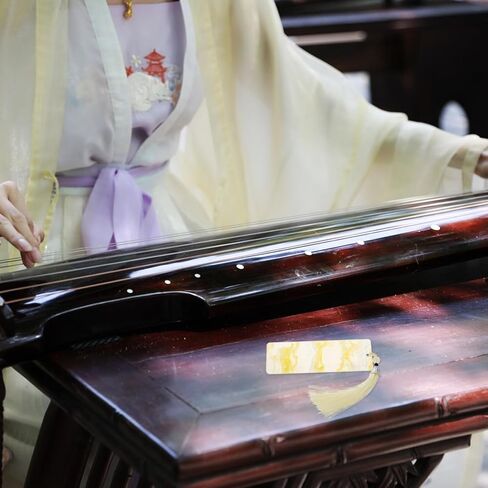 لوح تخزين الأظافر Guzheng قطعة واحدة من حامل حامي أطراف الأصابع لأظافر Guzheng وPipa مع شريط لاصق أصفر in Kuwait