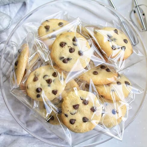 100 قطعة من أكياس السيلوفان الشفافة ذاتية الغلق - مثالية للبسكويت والهدايا والهدايا والحلوى | عبوة بلاستيكية سهلة الإغلاق in Kuwait