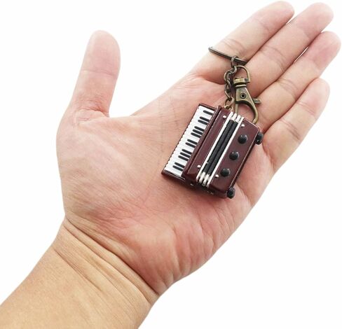 سلسلة مفاتيح آلة موسيقية مصغرة مع حافظة تماثيل صغيرة قابلة للجمع، نسخة طبق الأصل من حلقة مفاتيح هدايا عيد الميلاد وأعياد الميلاد in Kuwait