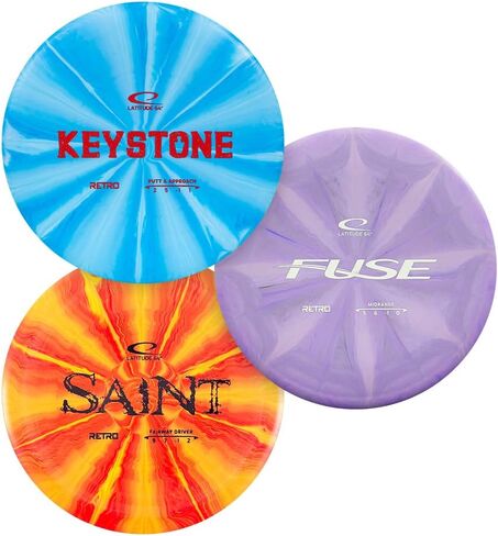 مجموعة أقراص الجولف Latitude 64 Retro Burst Disc (عبوة من 3 قطع) - مجموعة أقراص جولف للاعبين الجدد والمتوسطين | تتضمن كيستون، فيوز، سانت، باليستا | قاعدة بلاستيك جريبي | الألوان تختلف in Saudi Arabia