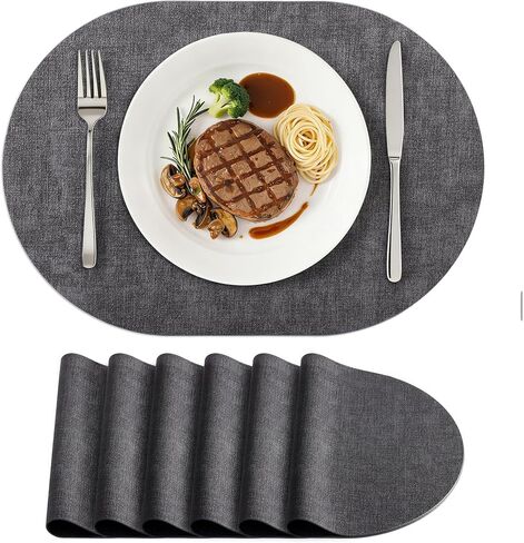 homing Placemats Set of 6, Heat Resistant Oval Faux Leather Place Mats 11.8 x 17 Inch, Waterproof Wipeable Reversible PU Placemat for Kitchen Dining Table, Indoor & Outdoor, Light Grey in Saudi Arabia