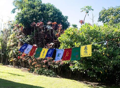 Buddha of Compassion Tibetan Prayer Flags Om Mani Padme Hum Set of 10 Five Tibetan Traditional Colors which are Yellow, Green, red, White and Blue. Each Color Represents an Element. in Saudi Arabia