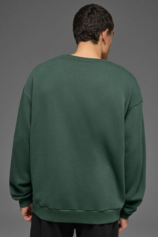 بلوفر Alo Yoga Chill برقبة دائرية - أخضر برسيم in Kuwait