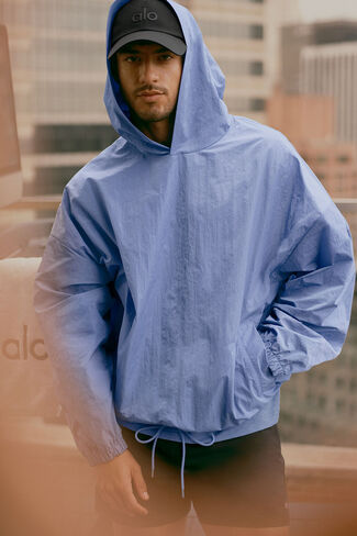 بلوفر بغطاء رأس من Alo Yoga Axis - أزرق بروفانس in Kuwait