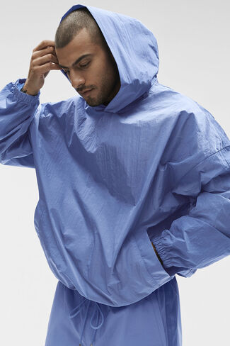 بلوفر بغطاء رأس من Alo Yoga Axis - أزرق بروفانس in Kuwait