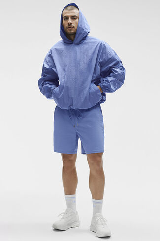 بلوفر بغطاء رأس من Alo Yoga Axis - أزرق بروفانس in Kuwait