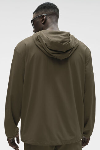 سترة Alo Yoga Performance On-The-Go - شجرة الزيتون in Kuwait