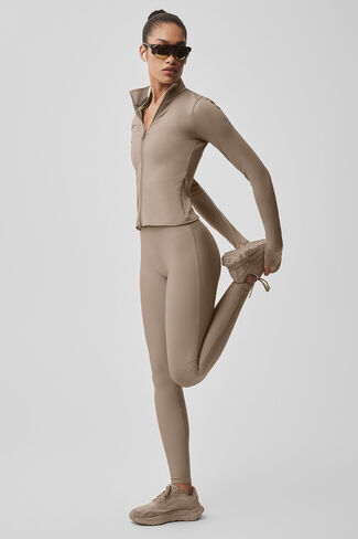 جاكيت Alo Yoga Airlift Winter Warm Radiant بسحاب كامل - حصى in Kuwait