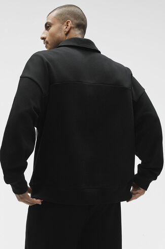 بلوفر Alo Yoga Take It Easy بأكمام طويلة من Henley - أسود in Kuwait