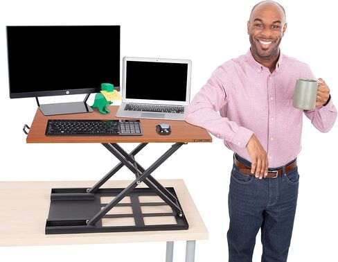 Stand Steady X-Elite Pro, Ergonomic Adjustable Height Standing Desk Converter for Home or Office, Easy Lift Sit to Stand Laptop Desk Riser for Laptop and Computer Monitor (Cherry, 28in x 20in) in Saudi Arabia