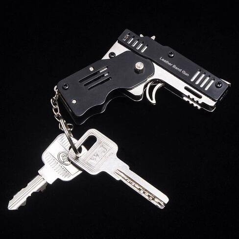 Mini Rubber Band Gun Metal Folding Gun Keychain with 100 Rubber Bands Made Entirely of zinc-Iron Alloy Material Sturdy and Durable (Black Leather Holster) in Saudi Arabia