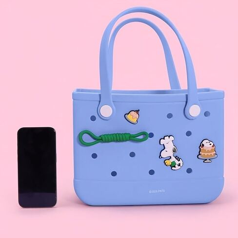MINISO Snoopy silicone perforated tote bag with charm, openwork design, blue, pink, and beige. in Saudi Arabia