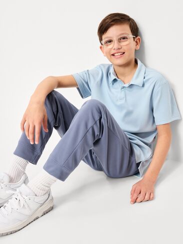 قميص بولو شبكي بأكمام قصيرة من Old Navy للأولاد - CHAMBRAY SKY in Saudi Arabia