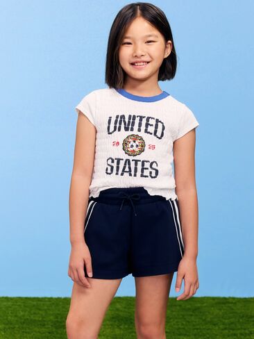 تي شيرت Old Navy كأس العالم لكرة القدم 26™ USA Smocked Graphic للفتيات - الولايات المتحدة الأمريكية in Kuwait