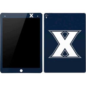 غلاف Skinit للكمبيوتر اللوحي متوافق مع iPad Pro 9.7in - تصميم شعار College Xavier مرخص رسميًا in Saudi Arabia