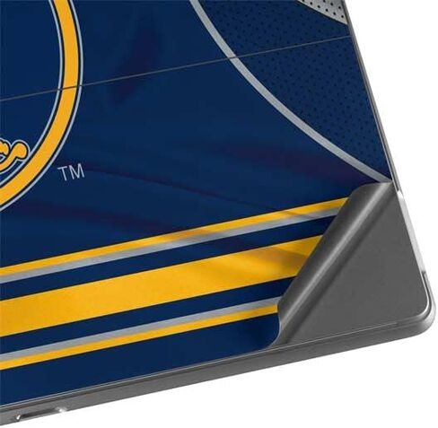 ملصق Skinit للكمبيوتر اللوحي متوافق مع Surface Pro 8 - تصميم جيرسي منزلي مرخص رسميًا من NHL Buffalo Sabers in Saudi Arabia