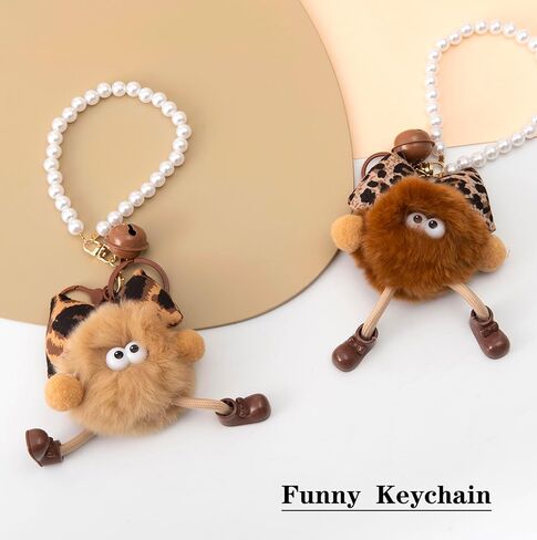 YOU WIZV Cute Plush Keychains for Women, Kawaii Anime Pom Pom Bag Charms with Bow Pearl Wristlet Key chain in Saudi Arabia