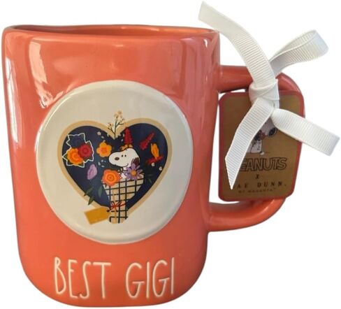 Rae Dunn Nana ceramic coffee mug. Pom pom and charm detail. Pink in Saudi Arabia