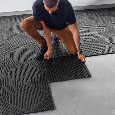 مجموعة من 12 قطعة من بلاط الأرضيات المتشابكة من EasyTile مع تصريف، وسجادات أرضية معيارية غير قابلة للانزلاق للاستخدام في المرآب وورش العمل، مقاس 18 × 18 بوصة، أسود in Kuwait