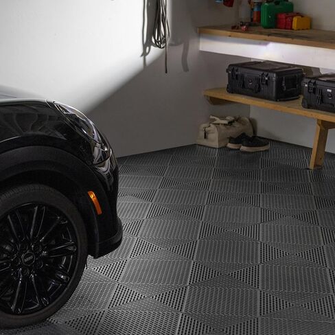 مجموعة من 12 قطعة من بلاط الأرضيات المتشابكة من EasyTile مع تصريف، وسجادات أرضية معيارية غير قابلة للانزلاق للاستخدام في المرآب وورش العمل، مقاس 18 × 18 بوصة، أسود in Kuwait