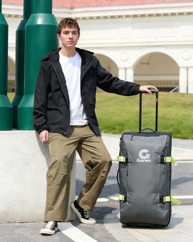 Gonex Rolling Duffle Bag with Wheels, Water-repellent 30 inch Nylon Large Wheeled Travel Duffel Luggage with TSA Lock & Telescopic Handle 100L, Navy Blue in Saudi Arabia