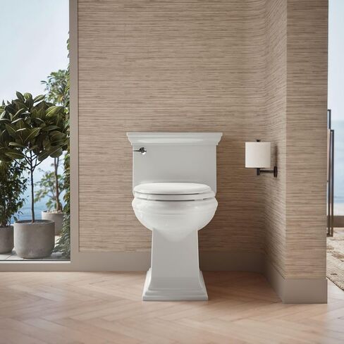 KOHLER K-6428-0 Memoirs Stately Comfort Height Skirted One-Piece Compact Elongated 1.28 GPF Toilet with AquaPiston Flush Technology and Left-Hand Trip Lever, White in Kuwait