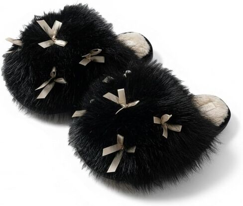 Comfortable bowknot home slippers with non-slip wavy-pattern soles and soft plush insoles. Available in pink, white and black. in Saudi Arabia